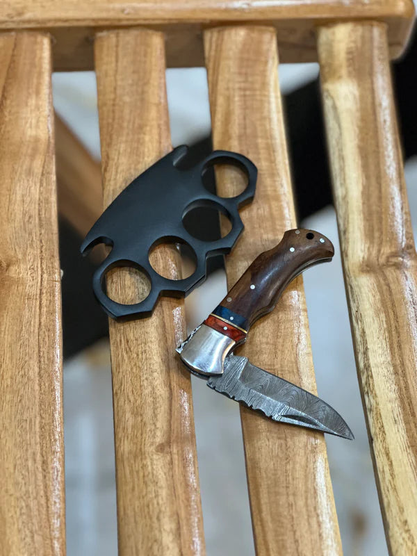 Custom handmade knuckle and folding knife