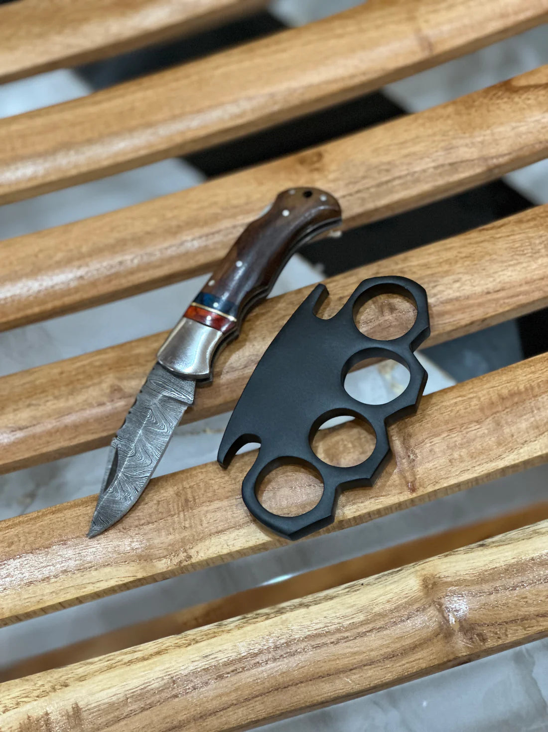 Custom handmade knuckle and folding knife